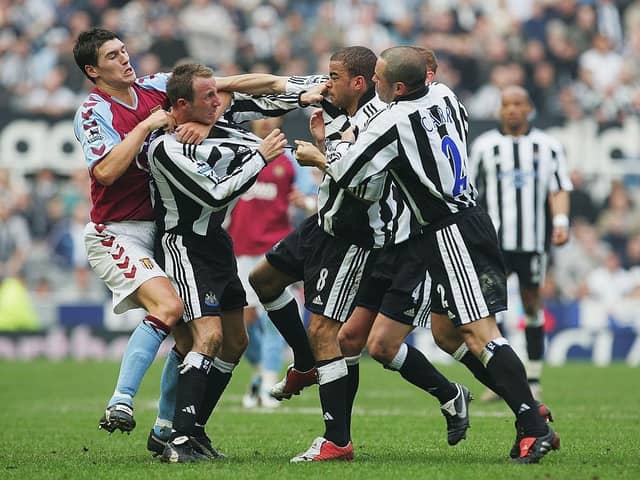 Lee Bowyer and Kieron Dyer of Newcastle come to blows during the FA Barclays Premiership match between Newcastle United and Aston Villa at St James Park on April 2, 2005 in Newcastle, England.  (Photo by Laurence Griffiths/Getty Images)