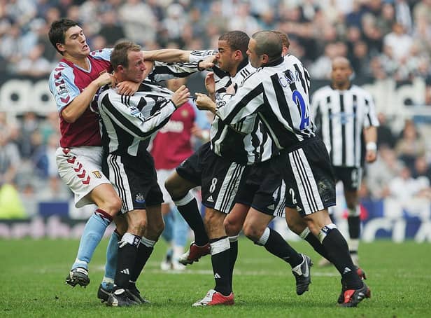 Lee Bowyer and Kieron Dyer of Newcastle come to blows during the FA Barclays Premiership match between Newcastle United and Aston Villa at St James Park on April 2, 2005 in Newcastle, England.  (Photo by Laurence Griffiths/Getty Images)