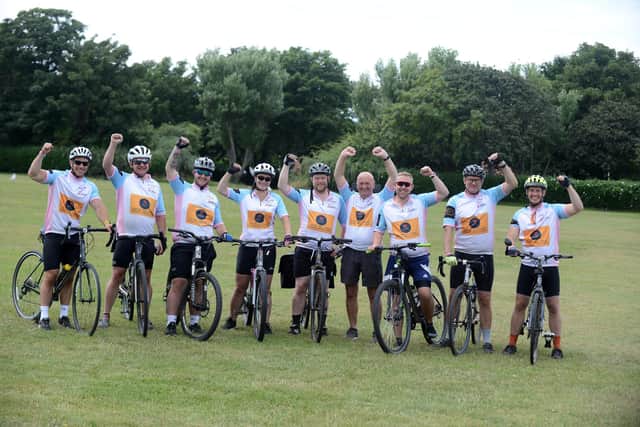 The Chloe and Liam Together Forever Trust fundraising team celebrate at the end of their coast-to-coast cycle challenge.