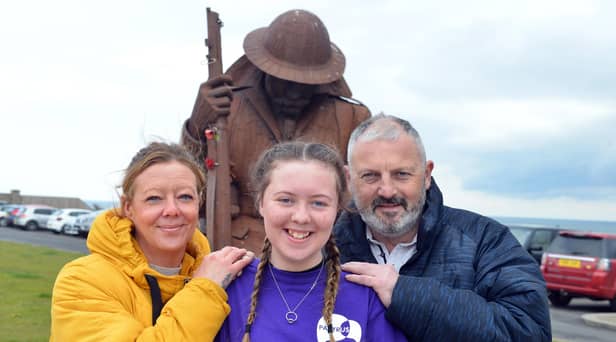 Heart transplant youngster Kayleigh Llewellyn with parents Shaun and Sonia Llewellyn.