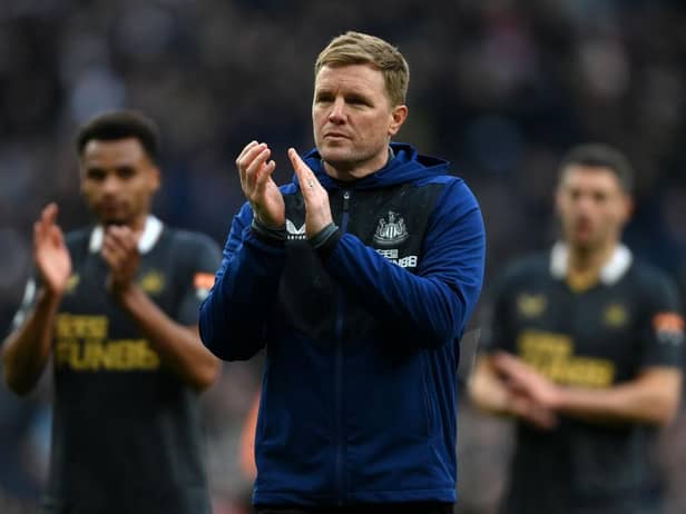 Eddie Howe applauds fans at the final whistle.