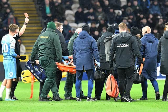 Sunderland player Elliot Embleton is stretchered off following his read card against Hull City.