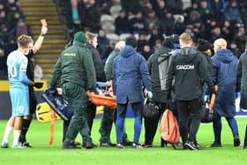 Sunderland player Elliot Embleton is stretchered off following his read card against Hull City.