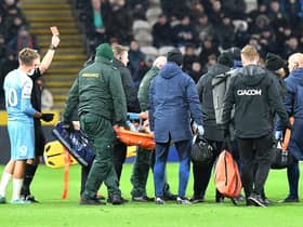 Sunderland player Elliot Embleton is stretchered off following his read card against Hull City.