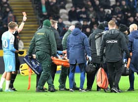 Sunderland player Elliot Embleton is stretchered off following his read card against Hull City.
