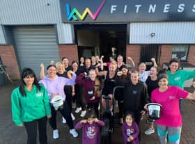 Participants of the charity event outside KW Fitness
