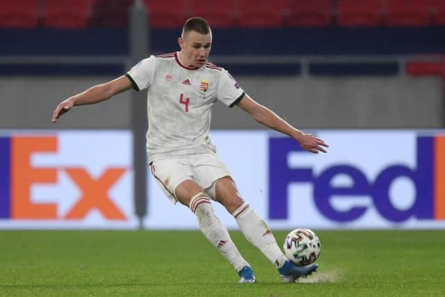 Fenerbahce and Hungary defender Attila Szalai has been linked with a move to Newcastle United. (Photo by ATTILA KISBENEDEK / AFP)