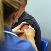 A coronavirus vaccination underway