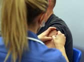 A coronavirus vaccination underway