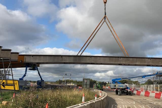 Photos by Highways England show the bridge under construction at Testo's Roundabout.
