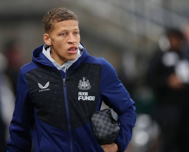 Dwight Gayle of Newcastle United looks on as he arrives at the stadium prior to the Premier League match between Newcastle United and Norwich City at St. James Park on November 30, 2021 in Newcastle upon Tyne, England. (Photo by Ian MacNicol/Getty Images)