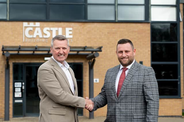 Tony Lister, CEO and executive director of Castle Building Services with new managing director Andrew Dawson.