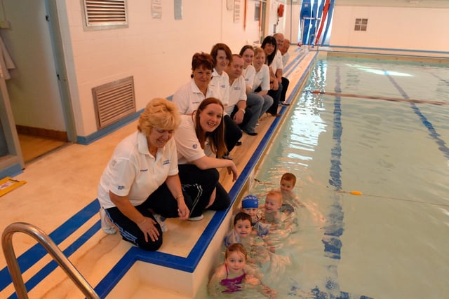 Swimming association coaches were pictured in 2006 with some of their young students. Recognise anyone?