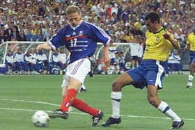 Frenchman Emmanuel Petit (L) is challenged by Brazilian Cafu on his way to score the third goal in the 1998 World Cup final (Picture: ANTONIO SCORZA/AFP via Getty Images)