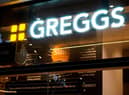 Signage is pictured outside a branch of the bakery chain Greggs inside London Bridge station on November 14, 2020. - Greggs has announced plans to cut over 800 jobs as a result of the coronavirus covid-19 pandemic. (Photo by Niklas HALLE'N / AFP) (Photo by NIKLAS HALLE'N/AFP via Getty Images)