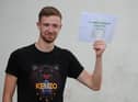 St Wilfrids RC Sixth Form student Owen Andre with his results.
