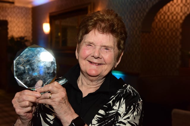 Lifetime Achievement Award winner Sheila Graber shows off her trophy.
