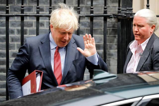Britain's Prime Minister Boris Johnson leaves 10 Downing Street in central London on July 15, 2020 ahead of the weekly Prime Minister's Questions (PMQs) session in the House of Commons. (Photo by Tolga AKMEN / AFP) (Photo by TOLGA AKMEN/AFP via Getty Images)