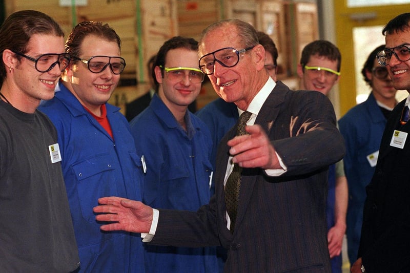 Prince Philip chats to some of the apprentices at the Waleswood factory.managing Director  Surbjit Nagra looked on (right) back in 1998