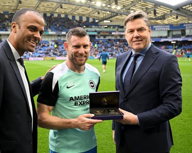 Maheta Molango, CEO of the Professional Footballers' Association, and Richard Masters, Chief Executive of the Premier League, awards James Milner an award in recognition of the most Premier League appearances. (Photo by Mike Hewitt/Getty Images)