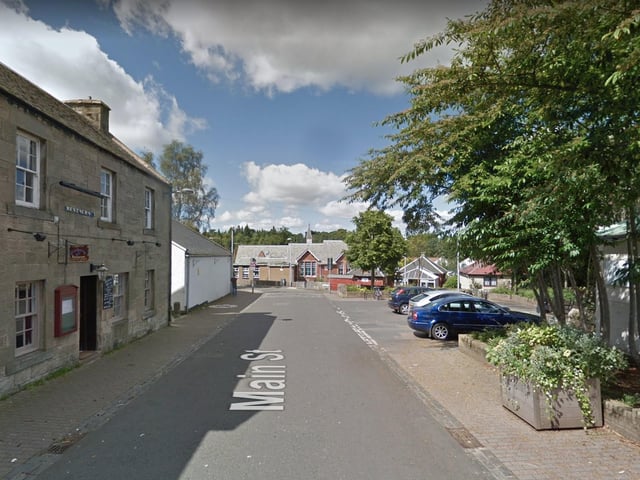 Temporary traffic lights for street lighting repairs at Dalmahoy Road.