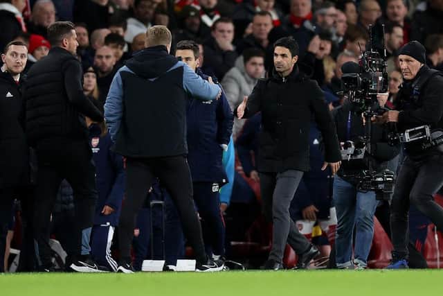 Mikel Arteta manager of Arsenal shakes hands with Eddie Howe manager of Newcastle United during the Premier League match between Arsenal FC and Newcastle United at Emirates Stadium on January 03, 2023 in London, England. (Photo by Julian Finney/Getty Images)