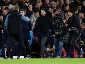 Mikel Arteta manager of Arsenal shakes hands with Eddie Howe manager of Newcastle United during the Premier League match between Arsenal FC and Newcastle United at Emirates Stadium on January 03, 2023 in London, England. (Photo by Julian Finney/Getty Images)