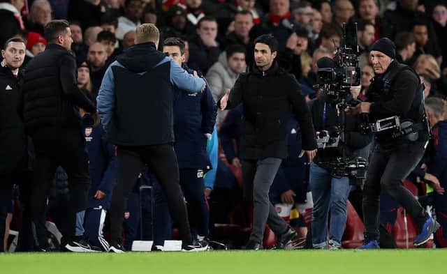 Mikel Arteta manager of Arsenal shakes hands with Eddie Howe manager of Newcastle United during the Premier League match between Arsenal FC and Newcastle United at Emirates Stadium on January 03, 2023 in London, England. (Photo by Julian Finney/Getty Images)