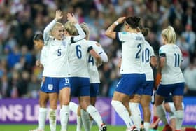 England's Lucy Bronze, right, celebrates scoring against Scotland at Sunderland's Stadium of Light. Photo by Owen Humphreys/PA Wire