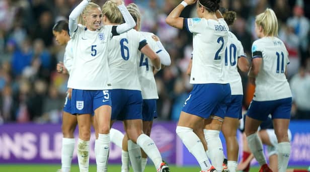 England's Lucy Bronze, right, celebrates scoring against Scotland at Sunderland's Stadium of Light. Photo by Owen Humphreys/PA Wire