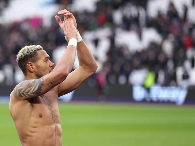 LONDON, ENGLAND - FEBRUARY 19: Joelinton of Newcastle United applauds fans after their sides draw in the Premier League match between West Ham United and Newcastle United at London Stadium on February 19, 2022 in London, England. (Photo by Warren Little/Getty Images)