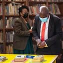Solomon Mguni, the mayor of Bulawayo, casts his eyes over some of the donated books.