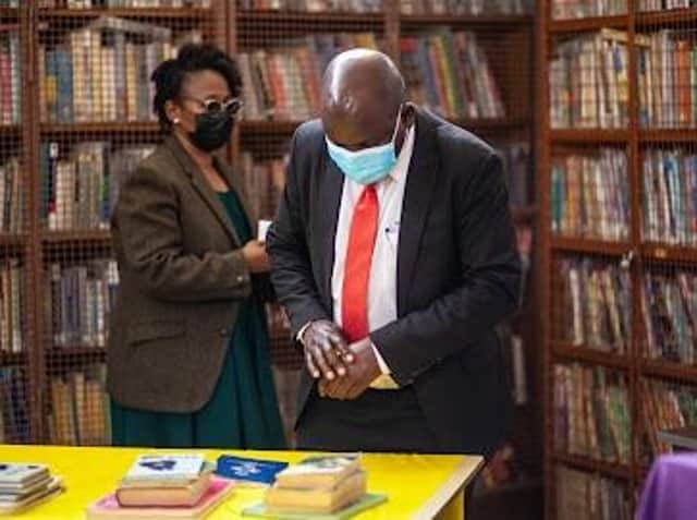 Solomon Mguni, the mayor of Bulawayo, casts his eyes over some of the donated books.