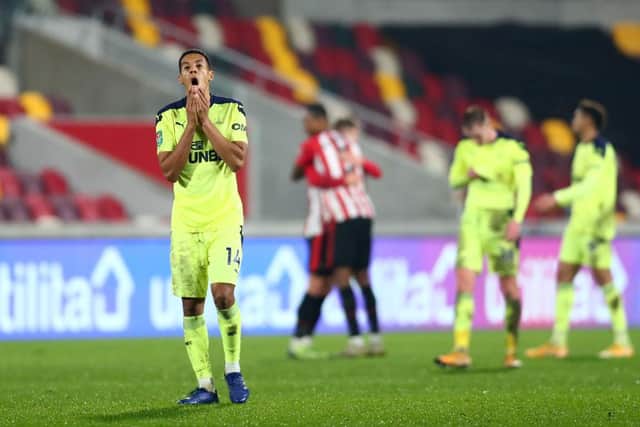 Isaac Hayden reacts to Newcastle United's Carabao Cup defeat to Brentford last season.