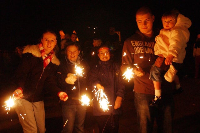 Sparklers for all. But do you recognise these people enjoying the night out?