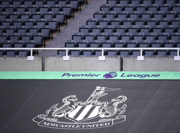 NEWCASTLE UPON TYNE, ENGLAND - JULY 05: General view inside the stadium where a Newcastle United banner is seen alongside the Premier League logo prior to the Premier League match between Newcastle United and West Ham United at St. James Park (Photo by Laurence Griffiths/Getty Images)