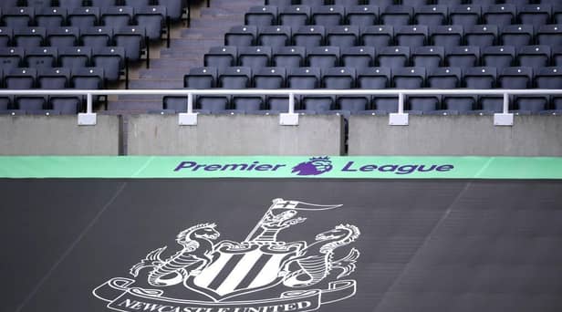 NEWCASTLE UPON TYNE, ENGLAND - JULY 05: General view inside the stadium where a Newcastle United banner is seen alongside the Premier League logo prior to the Premier League match between Newcastle United and West Ham United at St. James Park (Photo by Laurence Griffiths/Getty Images)