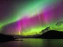 Aurora Borealis, also known as the Northern Lights, putting a show on dancing over Loch Glascarnoch, by Garve, in the Highlands