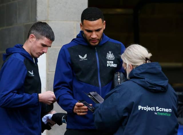 Ciaran Clark and Jamaal Lascelles arrive at St James's Park.