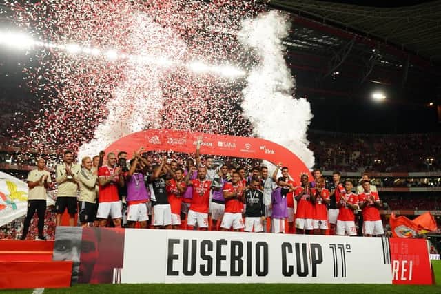 SL Benfica players celebrate with trophy after winning the Eusebio Cup match between SL Benfica and Newcastle United at Estadio da Luz on July 26, 2022 in Lisbon, Portugal.  (Photo by Gualter Fatia/Getty Images)