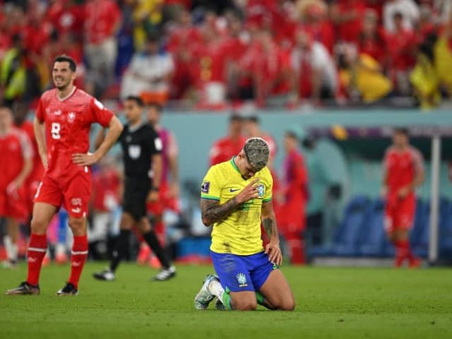 Bruno Guimaraes celebrates Brazil's win over Switzerland.