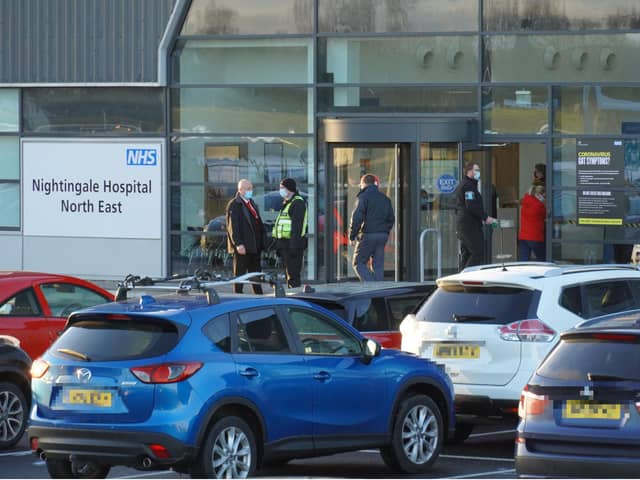 The hospital car park of Nightingale North East was busy as a line of people waited to enter the facility at the instruction of security staff on the door.