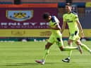 Newcastle United's English midfielder Jacob Murphy (L) celebrates after scoring the 1-1 equalising goal  during the English Premier League football match between Burnley and Newcastle United at Turf Moor in Burnley, north west England on April 11, 2021.
