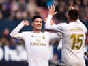 PAMPLONA, SPAIN - FEBRUARY 09: Luka Jovic of Real Madrid celebrates with Federico Valverde after scoring his team's fourth goal during the La Liga match between CA Osasuna and Real Madrid CF at El Sadar Stadium on February 09, 2020 in Pamplona, Spain. (Photo by Juan Manuel Serrano Arce/Getty Images)