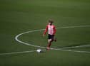 Dion Sanderson of Sunderland in action during the Sky Bet League One match between Shrewsbury Town and Sunderland at Montgomery Waters Meadow on February 09, 2021 in Shrewsbury.