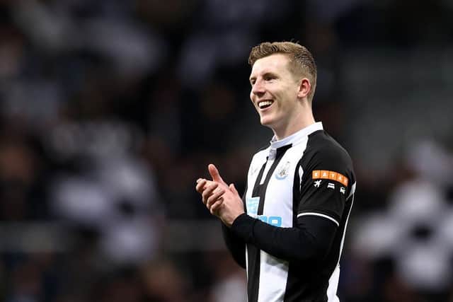 Matt Targett of Newcastle United applauds the fans after the Premier League match between Newcastle United and Wolverhampton Wanderers at St. James Park on April 08, 2022 in Newcastle upon Tyne, England. (Photo by Naomi Baker/Getty Images)