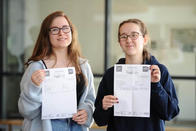 Harton Academy Sixth Form students Brooke Clifton and Hazel Salter collecting their results.