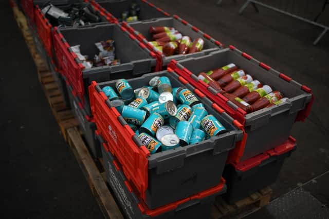 There are a number of ways to support a food bank in your local area. Picture: Daniel Leal-Olivas/AFP via Getty Images.