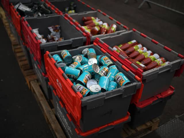 There are a number of ways to support a food bank in your local area. Picture: Daniel Leal-Olivas/AFP via Getty Images.