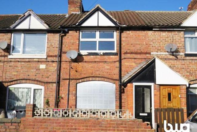 Three-bedroom, mid-terrace house - guide price £10,000-plus.